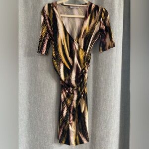 Jennifer Lopez 1/4 sleeve wrap dress size XS black, pink, yellow, white pattern